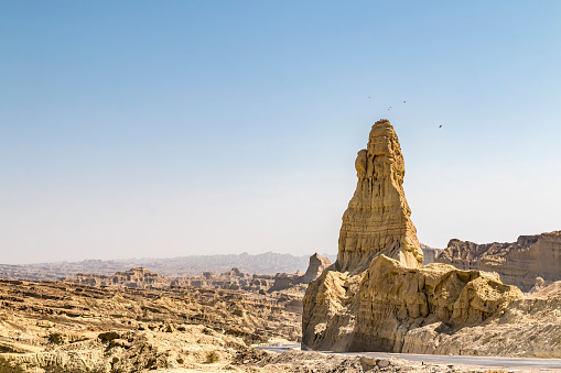 Natural rock formations and the Arabian Sea and Makran Coastal Highway from Karachi to Gwadar, passing through the Buzi pass, Makran Baluchistan, Pakistan