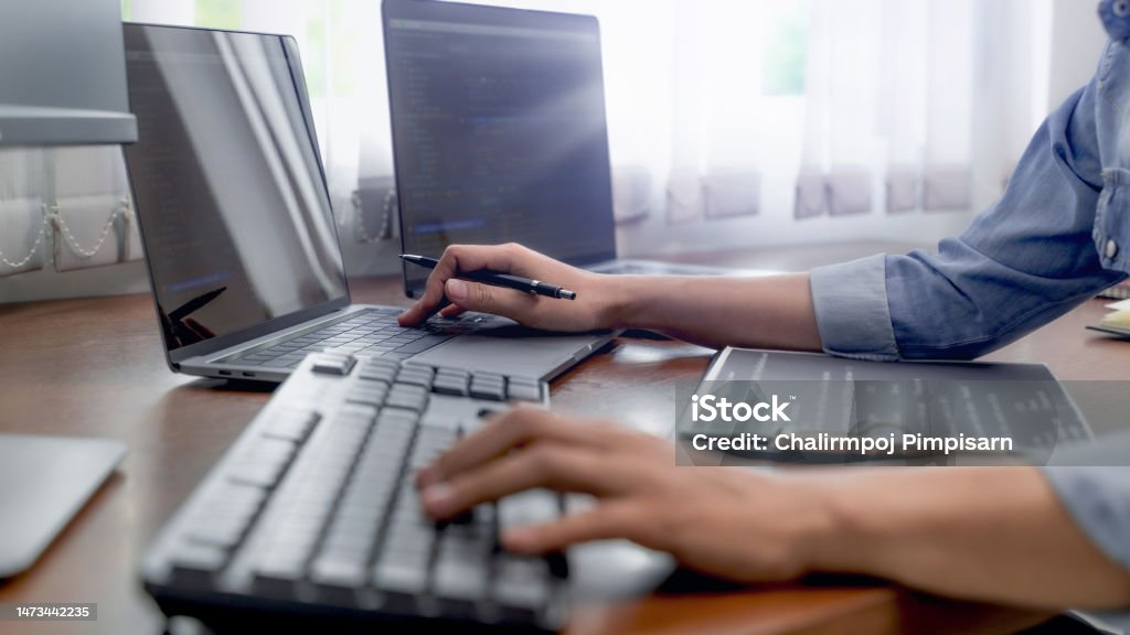 Development Programmer Writing A Code On Database Teamwork Cooperation ...
