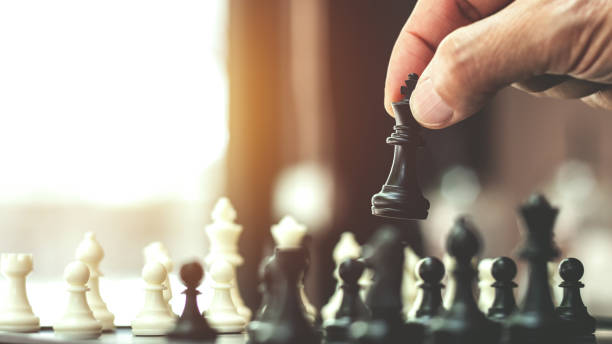 istock Business strategy, Chess board game management to victory. 1473442239
