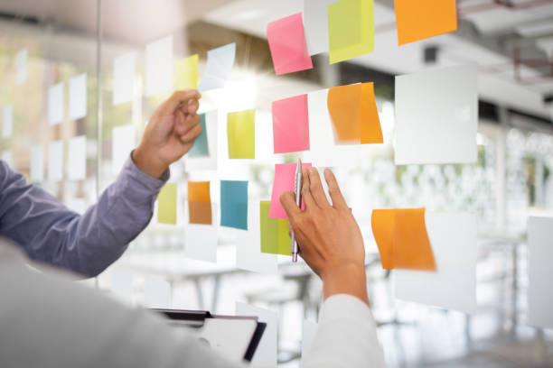 istock Business sales consultant discussing in data documents at modern office. 1473442297