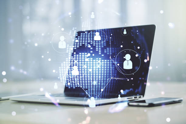 istock Social network concept with world map and modern laptop on background. Multiexposure 1473443632