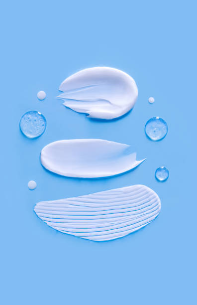 istock cosmetic smears cream texture on blue background 1473443769