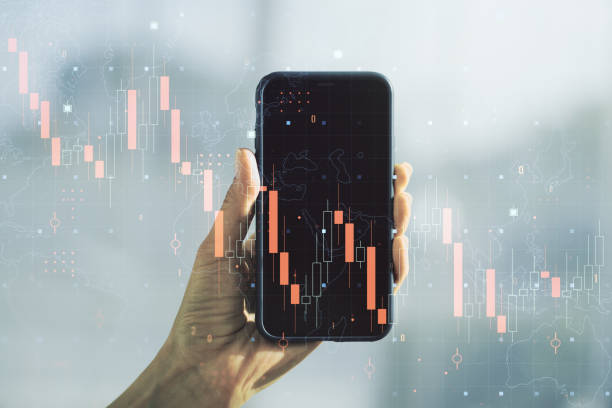 istock Creative abstract global crisis chart with world map sketch and hand with cellphone on background, falling markets and collapse of global economy concept. Double exposure 1473443801