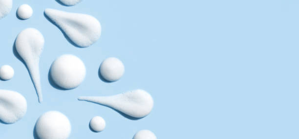 istock texture foam mousse foam cosmetic smear sample on blue background 1473444456
