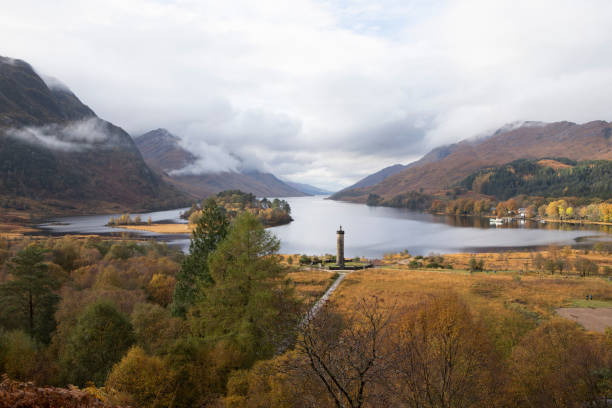 Glenfinnan monument and Loch Shiel in autumn Glenfinnan monument and Loch Shiel viewed from a high angle glenfinnan monument stock pictures, royalty-free photos & images