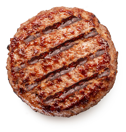 Grilled meat patty on white background.  File contains clipping path.