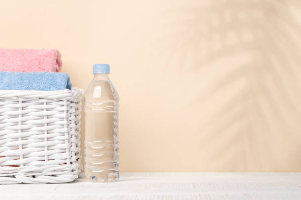 istock Water bottle and bathroom towels 1473456456