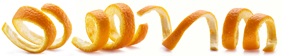 Set of orange peels or orange zests on white background.
