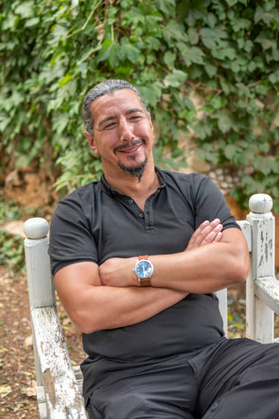 istock Handsome man posing outdoors 1473457486