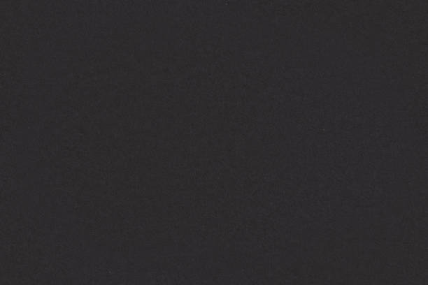 istock Black or dark gray paper with fine texture, seamless tileable background, image width 20cm 1473460434