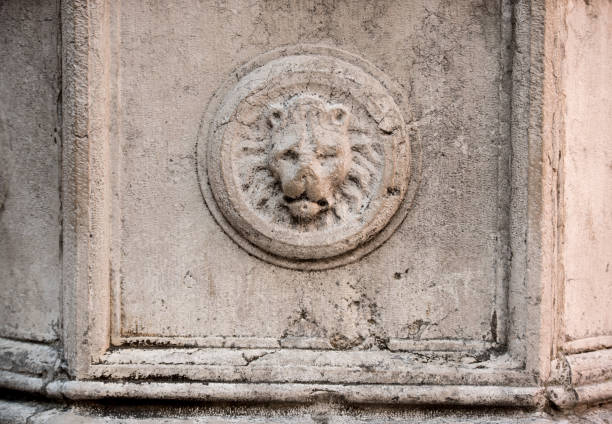 The mournful Lion Monument of Lucerne that commemorates the Swiss Guards who were massacred in 1792 during the French Revolution. The Lion Monument was designed by Bertel Thorvaldsen (1770-1884), a classicist Danish sculptor in 1819 while he stayed in Rome, Italy. Lucas Ahorn (1789-1856), a stone-mason from Constance (southern Germany) actually carved it out of the sandstone rock in 1820/1821. The Lion Monument was inaugurated on August 10, 1821. Originally the site was private property. In 1882 the city of Lucerne bought it. The site is open to the public and accessible without an entrance fee. The monument soon became one of Lucerne's major tourist attractions.