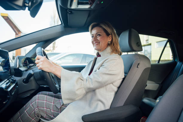 istock Driving Sustainable Electric Car to Work 1473461017