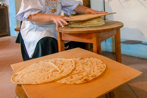 preparation of Sardinian Pane Carasau, Carasau bread, traditional crispy bread of Sardinia, Italy