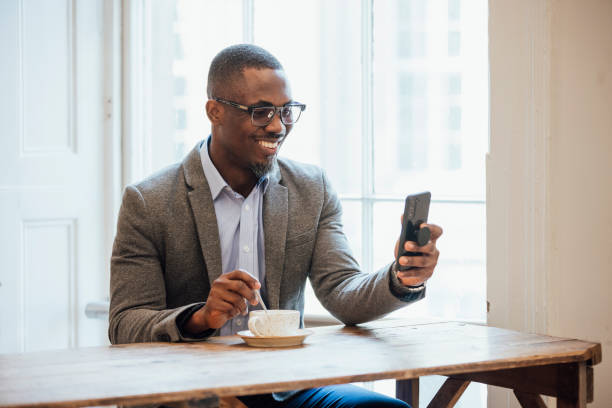 Businessman Video Calling in Cafe