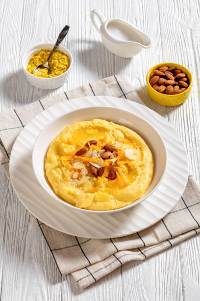 istock corn grits with butter, vegan cheese, and almonds 1473463992