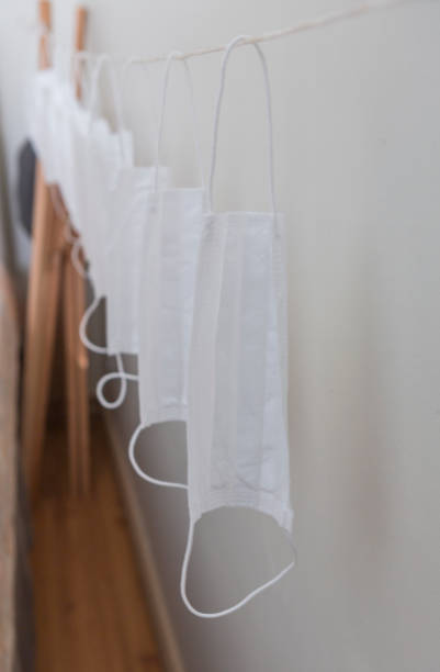 istock white covid protective face mask hanged during pandemic lock down to sanitize at istanbul turkey 1473465688