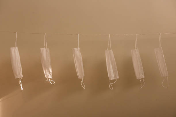 istock white covid protective face mask hanged during pandemic lock down to sanitize at istanbul turkey 1473465723