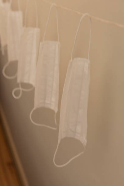 istock white covid protective face mask hanged during pandemic lock down to sanitize at istanbul turkey 1473465778