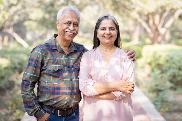 istock Loving senior couple admiring view in park 1473466029