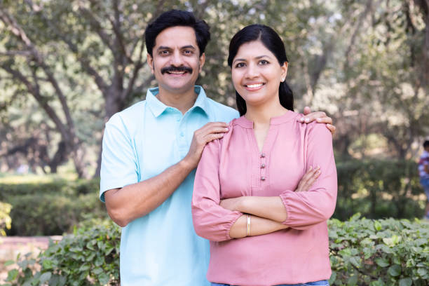istock Couple having fun at park 1473466116