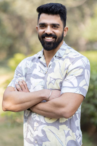 istock Confident man at park and looking at camera. 1473466988
