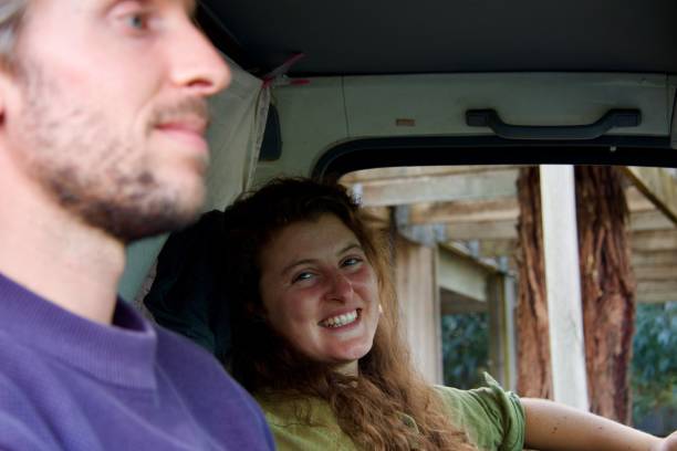 istock Young couple driving in a motor home 1473468392
