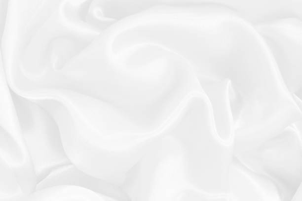 istock White fabric texture background, detail of silk or linen pattern. 1473470311