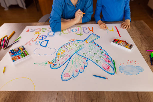 istock Inspiring Young Minds: Mother and Daughter Creating for a Cause 1473470943