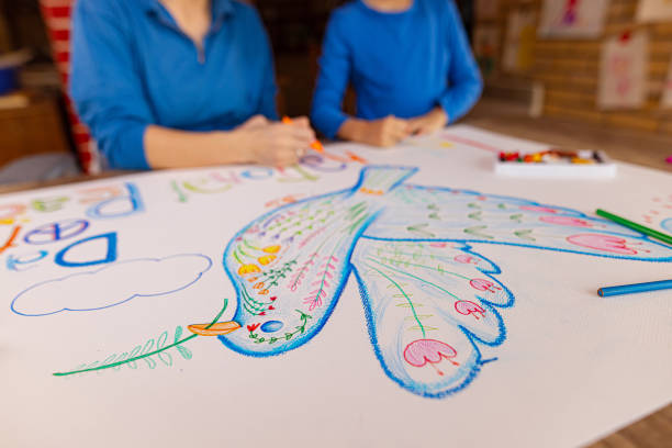 istock Mother and Daughter Promoting Peace 1473471054