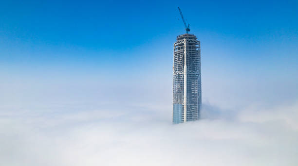 istock Tall buildings in the clouds 1473471617