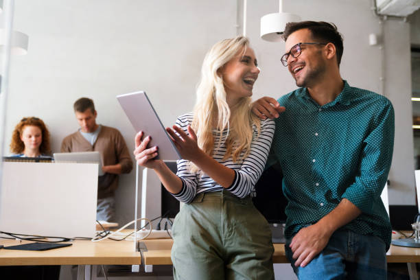 istock Business solutions, technology and strategy concept. Colleagues working and brainstorming in office 1473478465