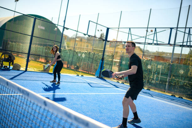 istock Young people playing Padel Tennis 1473483279