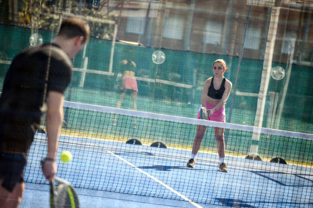 istock Young people playing Padel Tennis 1473483414