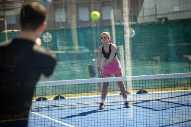 istock Young people playing Padel Tennis 1473483495