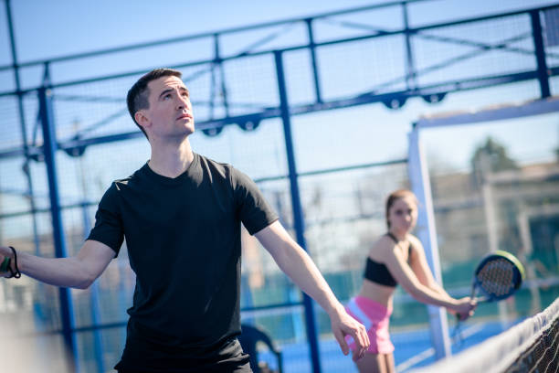 istock Young people playing Padel Tennis 1473484270