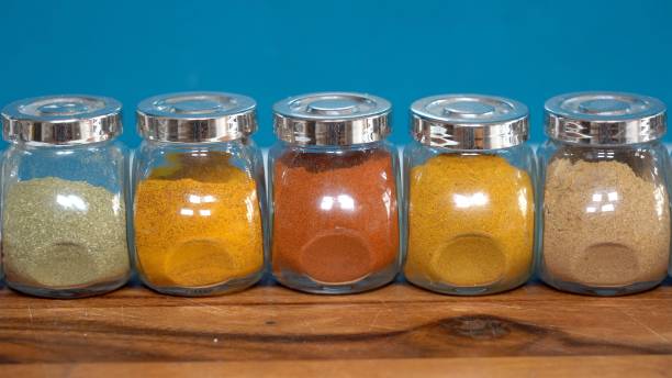 istock Spices for cooking - Cumin, paprika, curry, turmeric, chilli pepper, pepper, salt, ginger are typical spices of African Moroccan Indian cuisine - health and well-being in  kitchen - Mediterranean diet 1473486267