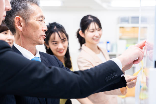 istock Office members exchanging diverse opinions 1473492186