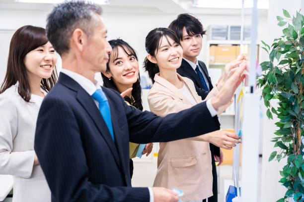 istock Office members exchanging diverse opinions 1473492188