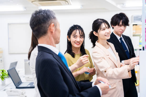 istock Office members exchanging diverse opinions 1473492202