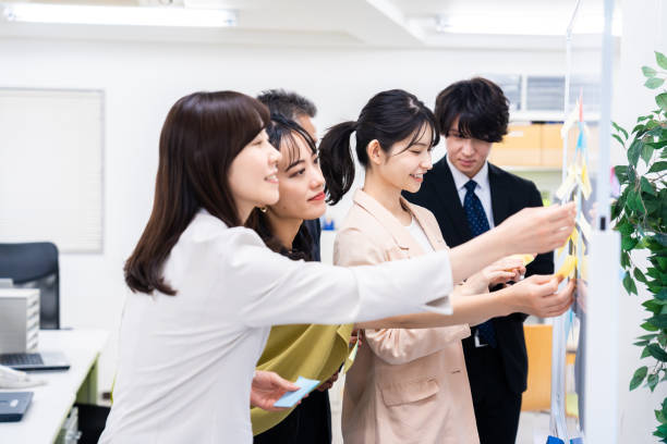 istock Office members exchanging diverse opinions 1473492214