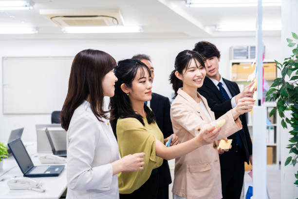 istock Office members exchanging diverse opinions 1473492216