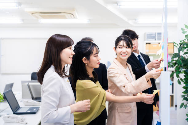 istock Office members exchanging diverse opinions 1473492234