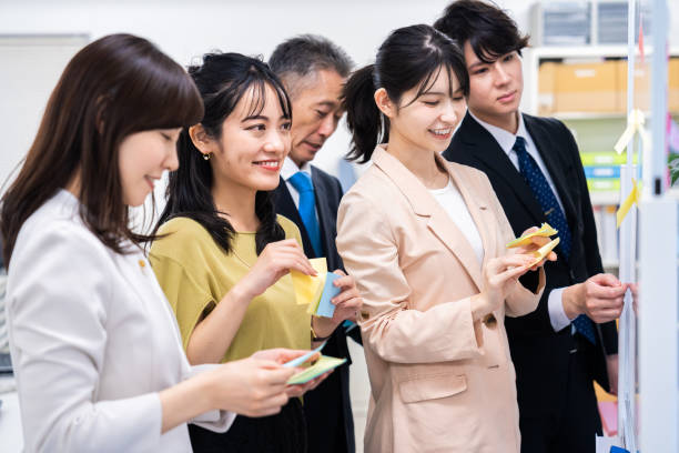 istock Office members exchanging diverse opinions 1473492237