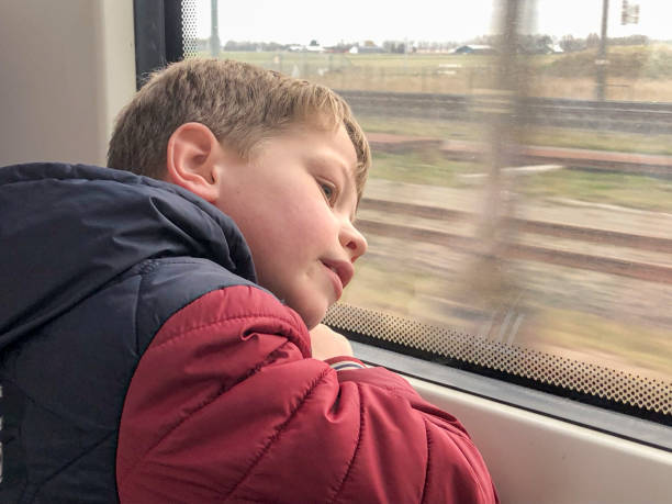 istock Little boy on the train 1473495761