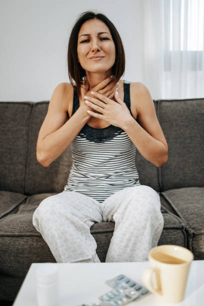 istock Woman PMS at home 1473495872