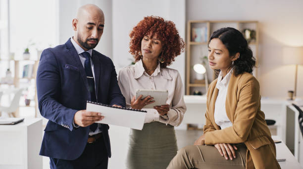 istock Office proposal, documents and business people teamwork on brand advertising, sales forecast or data analysis. Research insight report, paperwork or collaboration review of spreadsheet statistics 1473496321
