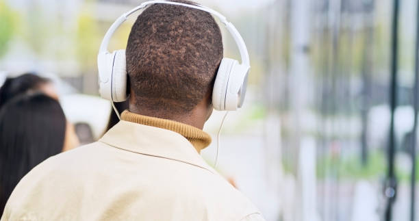 istock Man listening music 1473496391