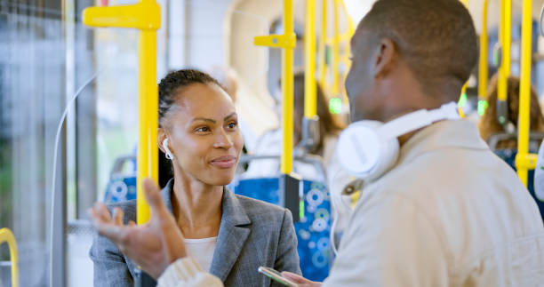 istock Business people talking in bus 1473496430