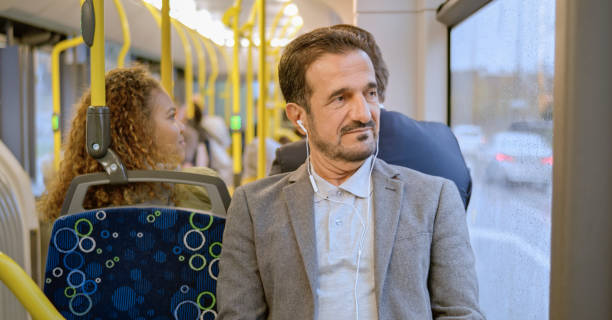 istock Passenger listening music in bus 1473496431