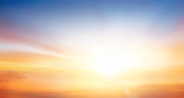 istock Panorama of dramatic sunset sky with a sunbeams 1473497706